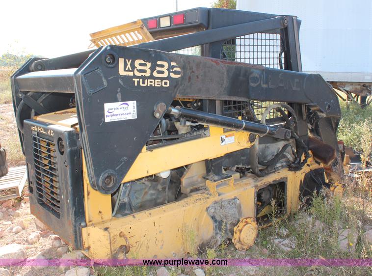 image for item H6819 New Holland LX885 skid steer