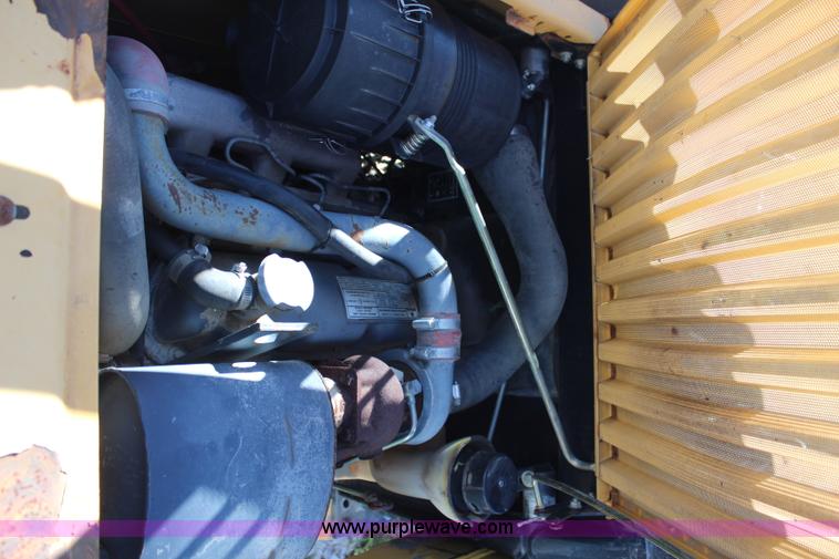 image for item H6819 New Holland LX885 skid steer