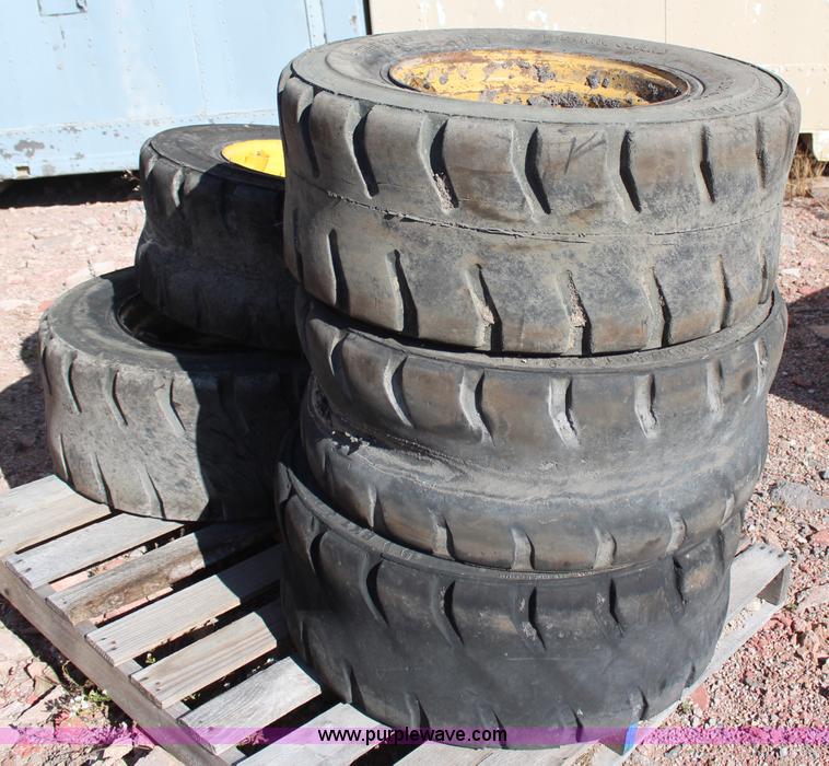 image for item H6819 New Holland LX885 skid steer