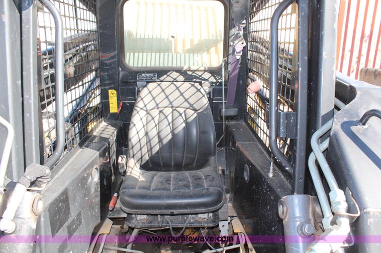 image for item H6819 New Holland LX885 skid steer