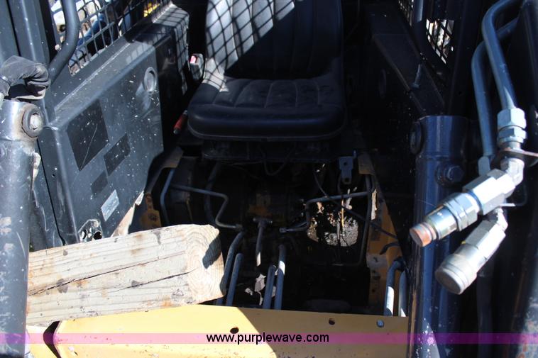 image for item H6819 New Holland LX885 skid steer