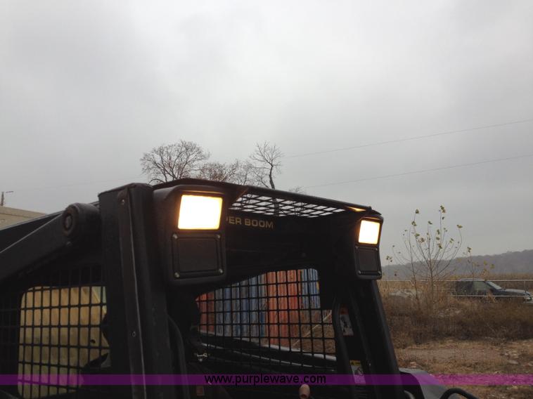 image for item H6819 New Holland LX885 skid steer