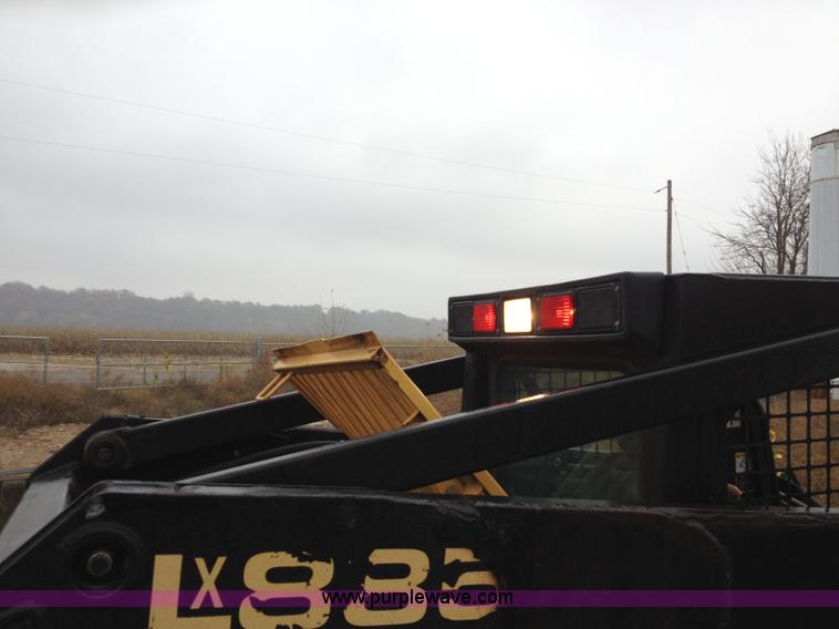 image for item H6819 New Holland LX885 skid steer