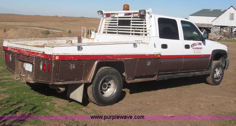 image for item F7161 2003 GMC Sierra 3500 Crew Cab utility truck