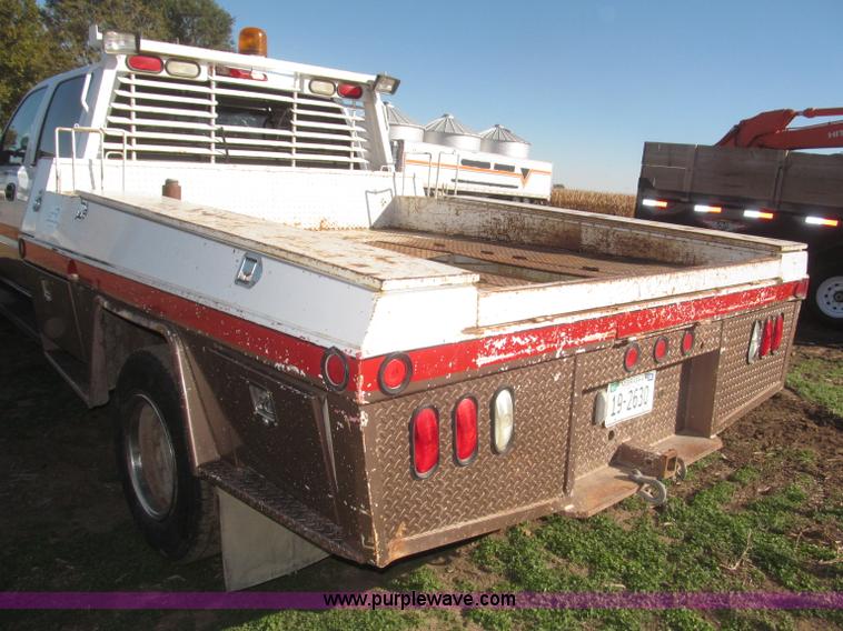 image for item F7161 2003 GMC Sierra 3500 Crew Cab utility truck