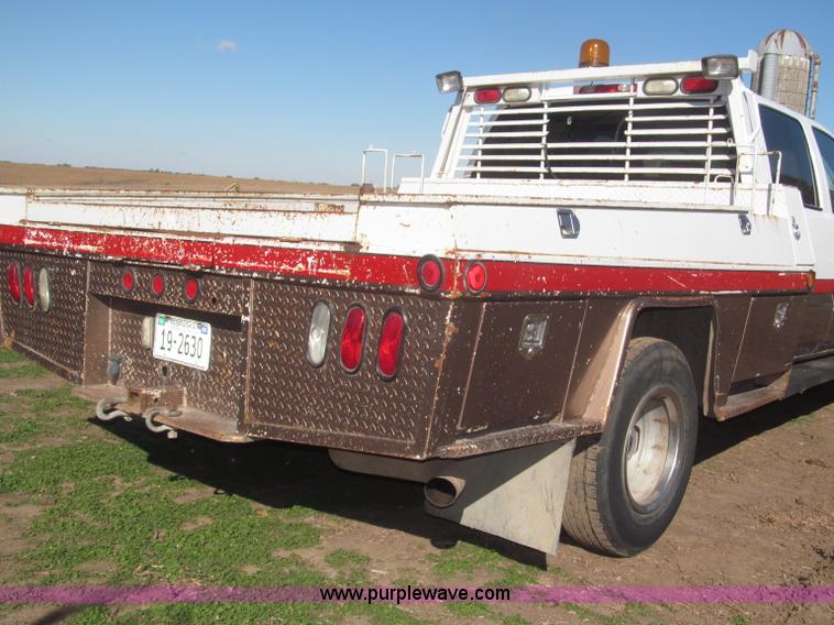 image for item F7161 2003 GMC Sierra 3500 Crew Cab utility truck