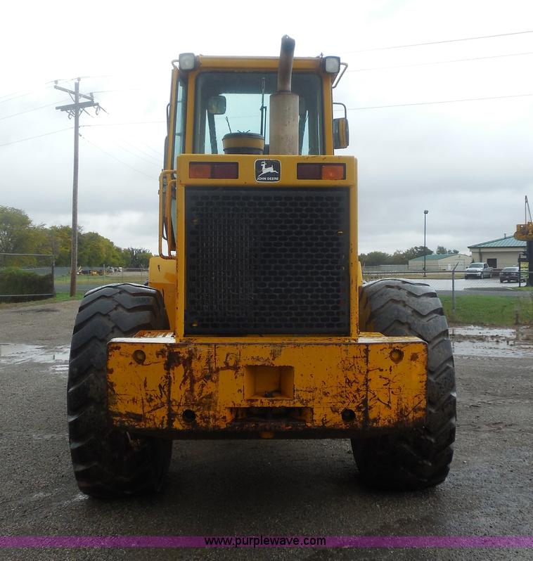 image for item E7746 1990 John Deere 644E articulated wheel loader