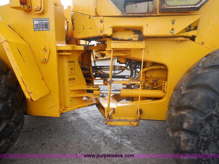 image for item E7746 1990 John Deere 644E articulated wheel loader