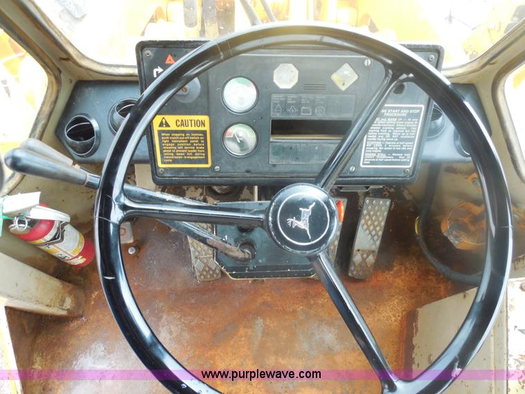 image for item E7746 1990 John Deere 644E articulated wheel loader