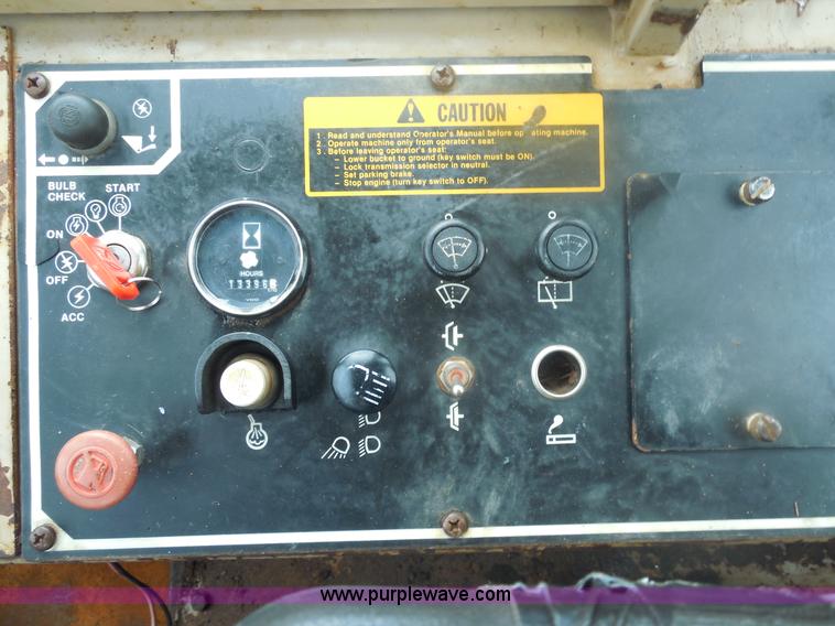 image for item E7746 1990 John Deere 644E articulated wheel loader