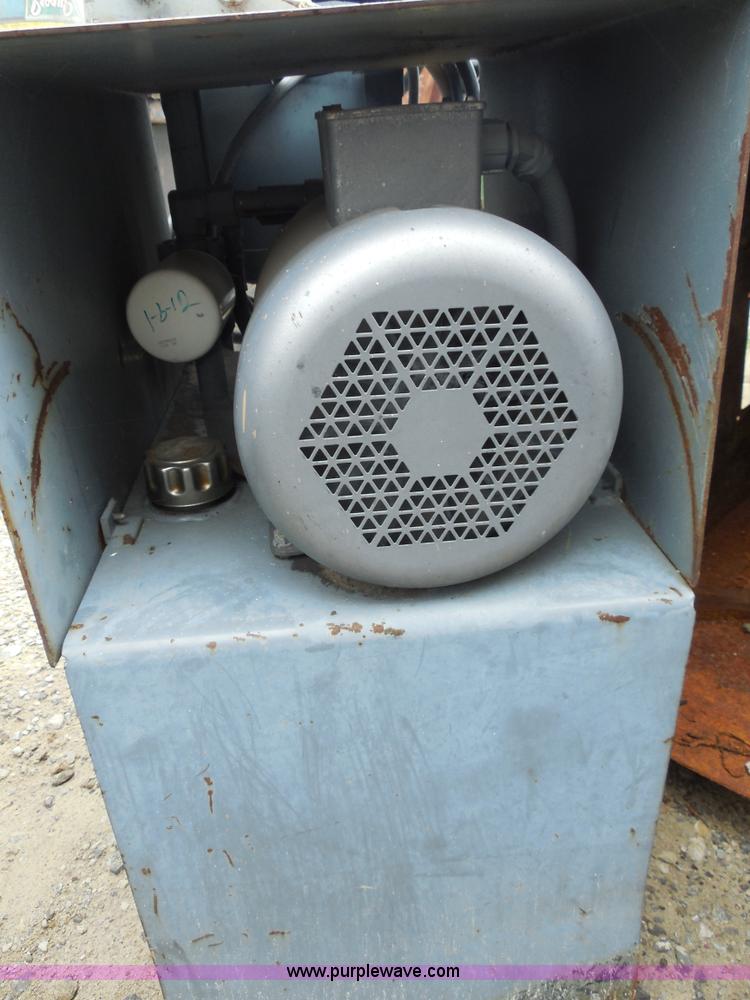 image for item F3240 1999 Cram-A-Lot 30 yard self-contained compactor