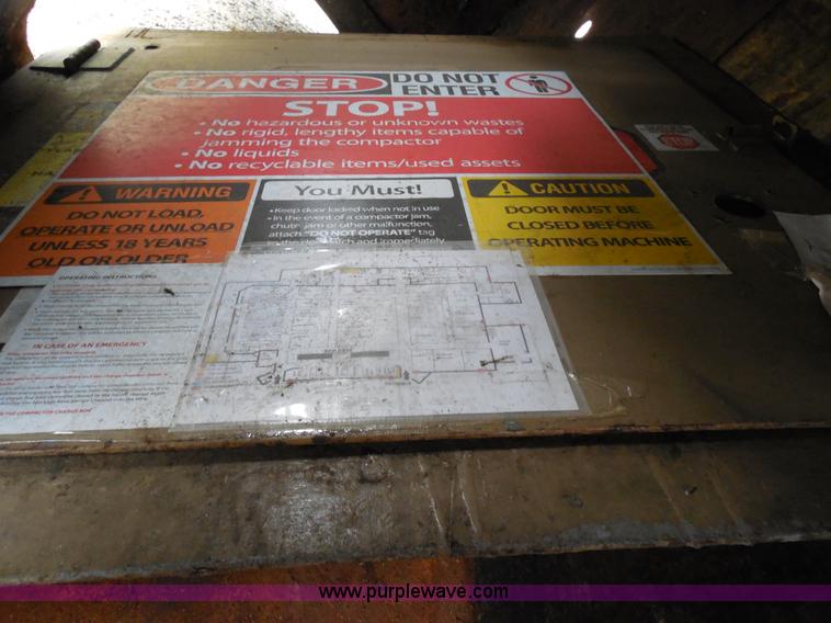 image for item F3240 1999 Cram-A-Lot 30 yard self-contained compactor