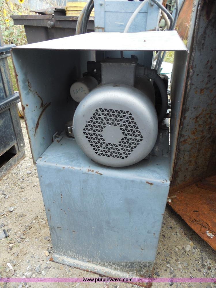 image for item F3240 1999 Cram-A-Lot 30 yard self-contained compactor