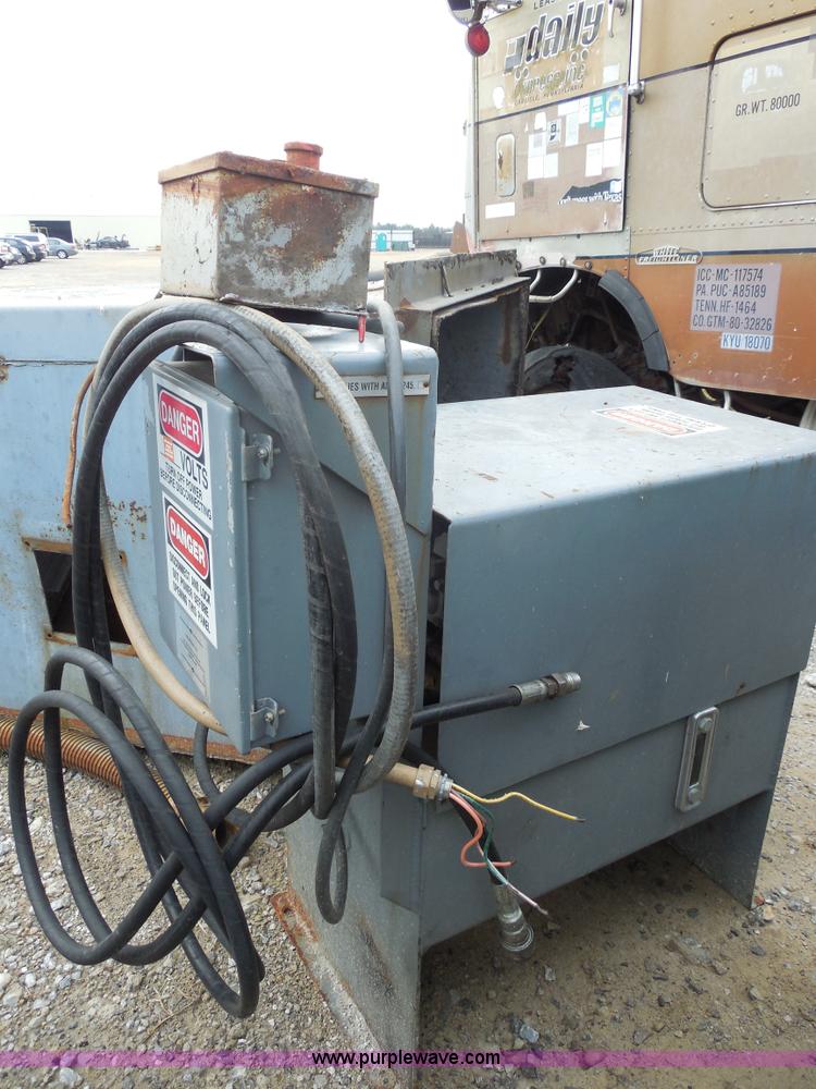 image for item F3240 1999 Cram-A-Lot 30 yard self-contained compactor