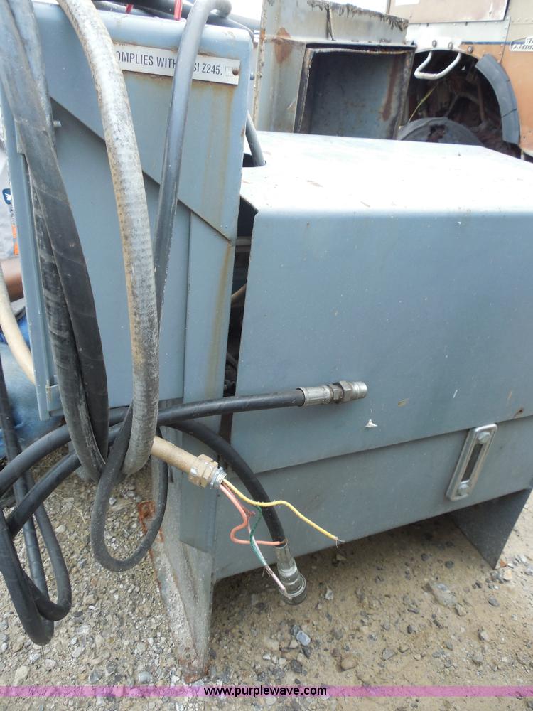 image for item F3240 1999 Cram-A-Lot 30 yard self-contained compactor