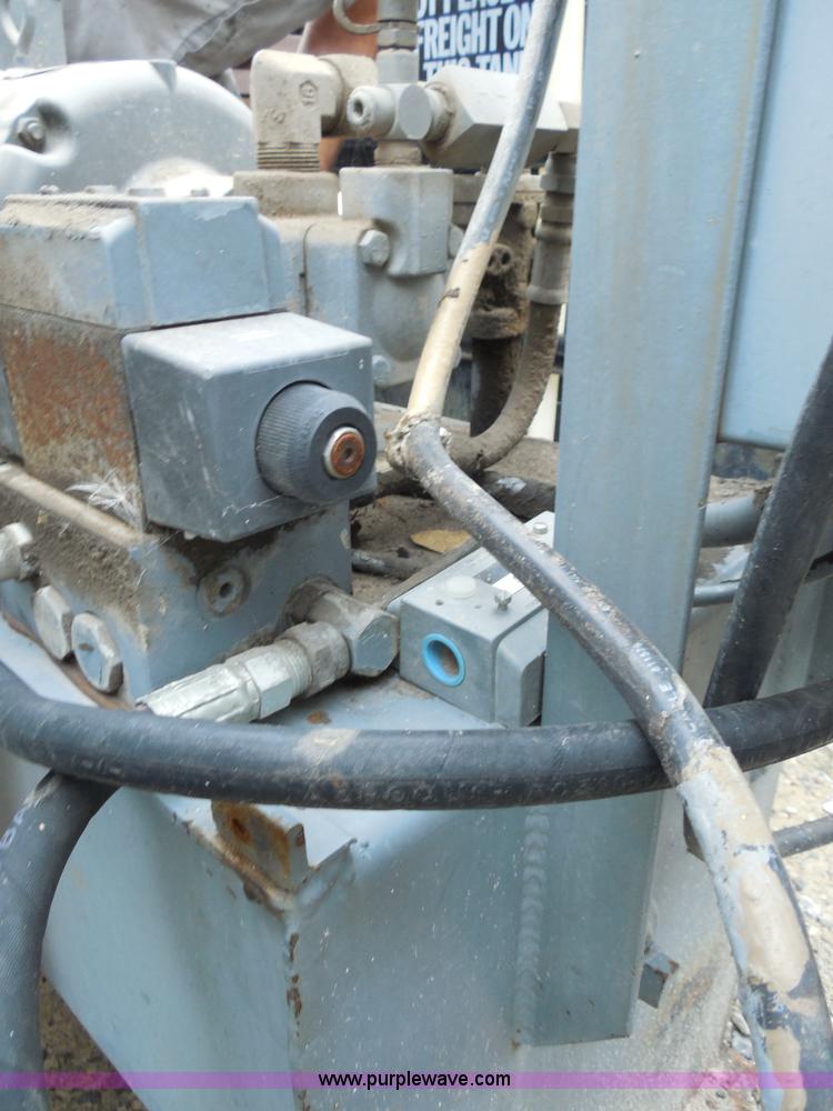 image for item F3240 1999 Cram-A-Lot 30 yard self-contained compactor