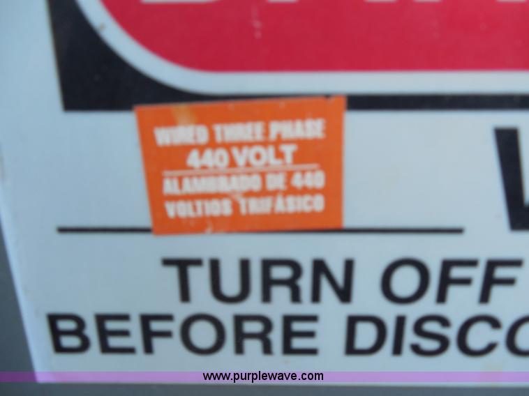 image for item F3240 1999 Cram-A-Lot 30 yard self-contained compactor