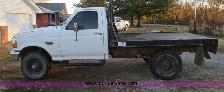 image for item F8020 1992 Ford F250 HD Custom flatbed pickup truck
