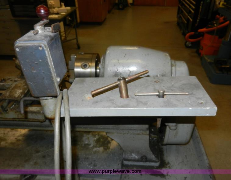 image for item AT9259 Logan 825 manual lathe with cabinet