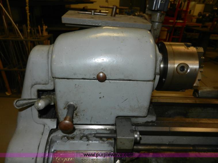 image for item AT9259 Logan 825 manual lathe with cabinet