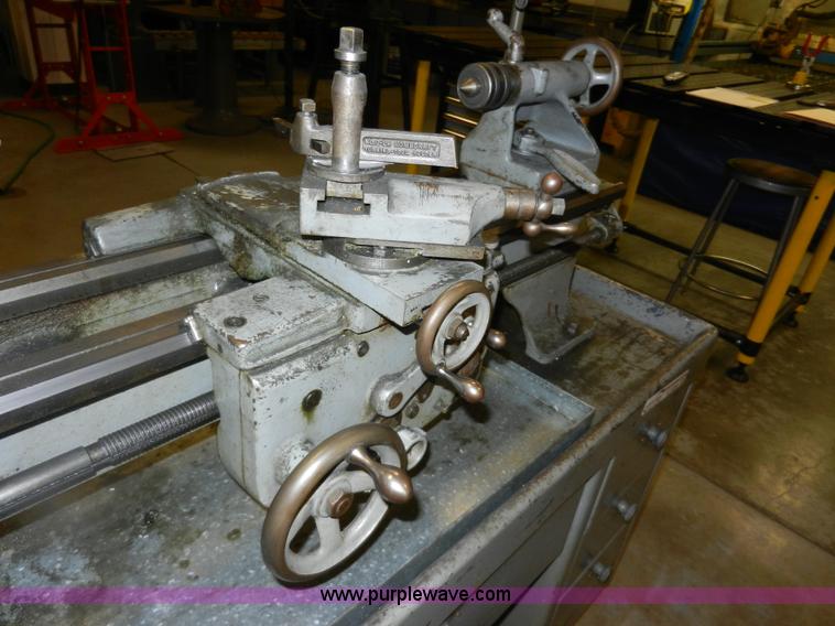 image for item AT9259 Logan 825 manual lathe with cabinet