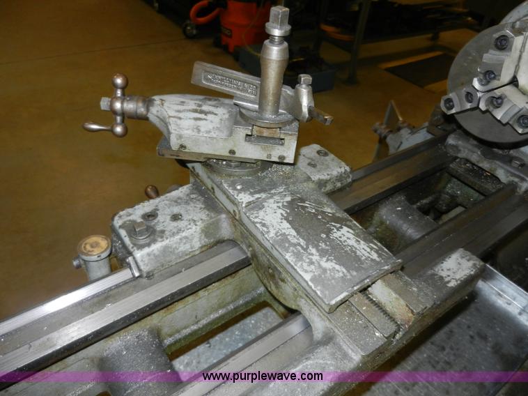 image for item AT9259 Logan 825 manual lathe with cabinet
