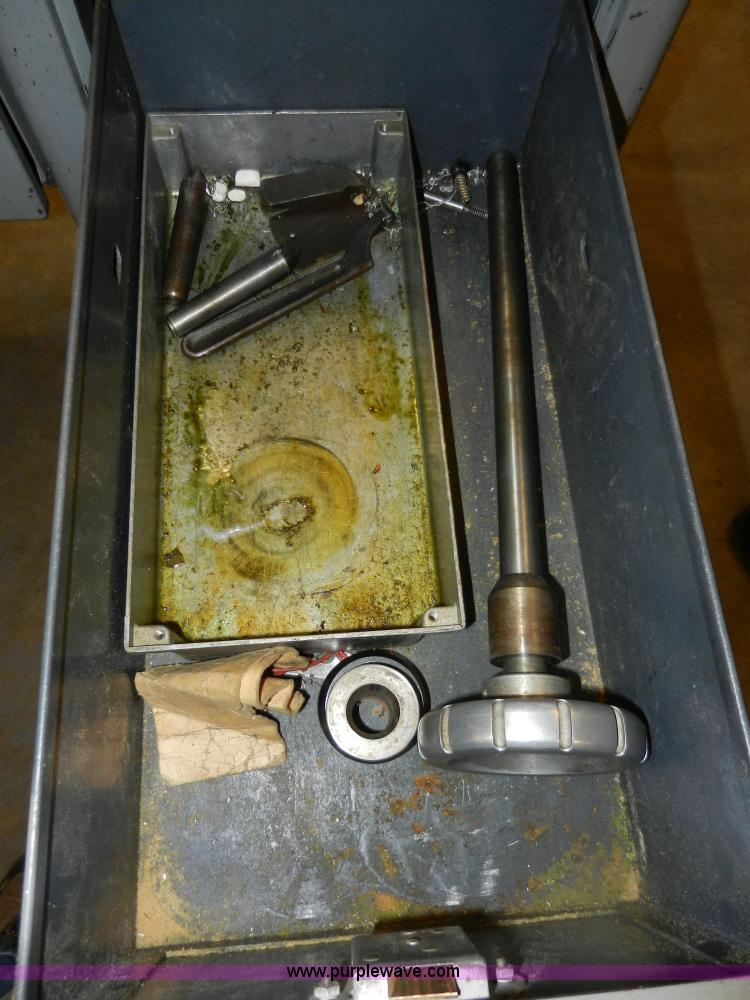 image for item AT9259 Logan 825 manual lathe with cabinet