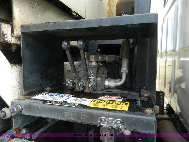 image for item D6068 1997 Ford L8501 Louisville 101 sewer cleaning truck