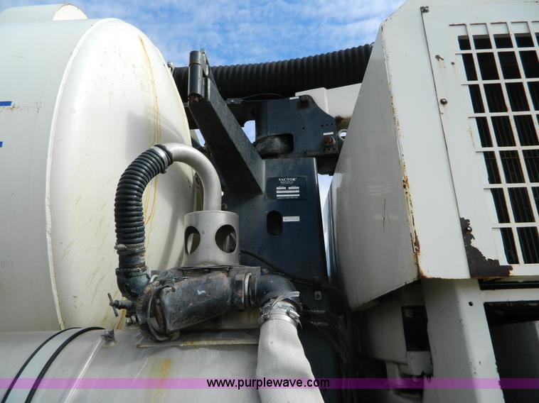 image for item D6068 1997 Ford L8501 Louisville 101 sewer cleaning truck