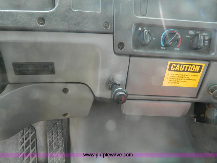 image for item D6068 1997 Ford L8501 Louisville 101 sewer cleaning truck