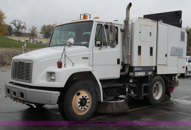 image for item G2173 2003 Freightliner FL70 truck with Schwarze M6000 sweeper