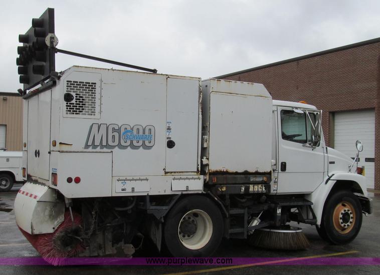 image for item G2173 2003 Freightliner FL70 truck with Schwarze M6000 sweeper