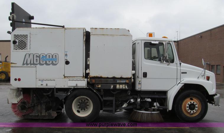 image for item G2173 2003 Freightliner FL70 truck with Schwarze M6000 sweeper