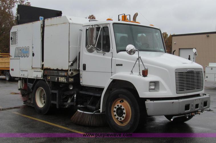 image for item G2173 2003 Freightliner FL70 truck with Schwarze M6000 sweeper