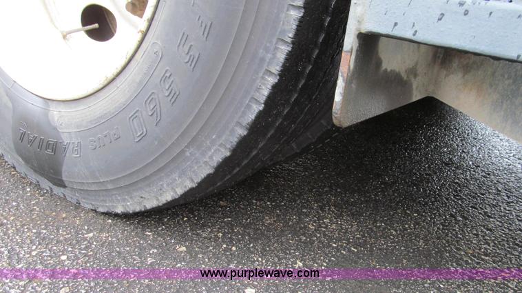 image for item G2173 2003 Freightliner FL70 truck with Schwarze M6000 sweeper