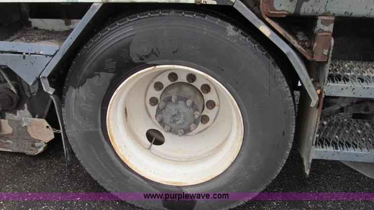 image for item G2173 2003 Freightliner FL70 truck with Schwarze M6000 sweeper