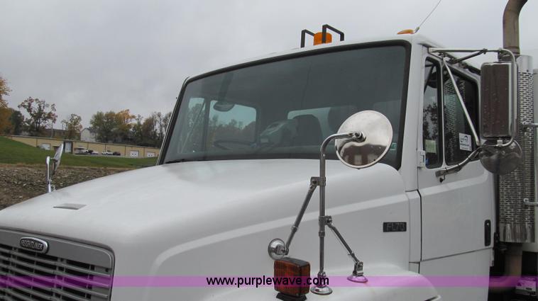 image for item G2173 2003 Freightliner FL70 truck with Schwarze M6000 sweeper