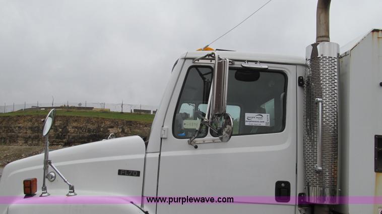 image for item G2173 2003 Freightliner FL70 truck with Schwarze M6000 sweeper