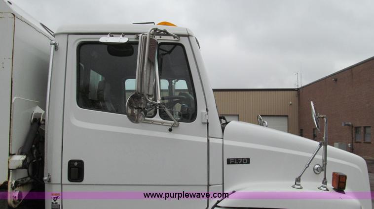 image for item G2173 2003 Freightliner FL70 truck with Schwarze M6000 sweeper