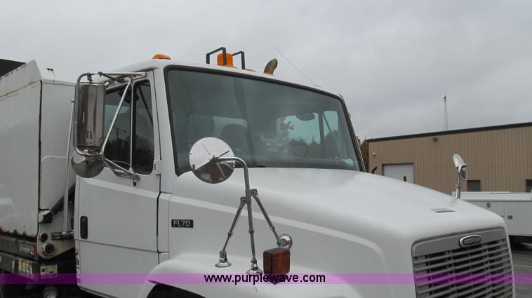 image for item G2173 2003 Freightliner FL70 truck with Schwarze M6000 sweeper