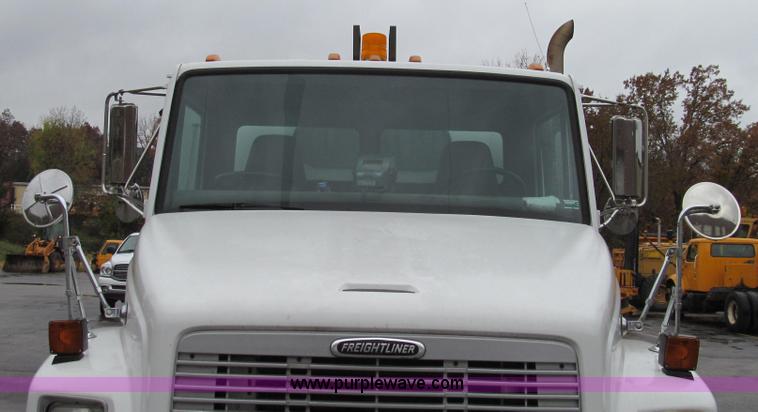 image for item G2173 2003 Freightliner FL70 truck with Schwarze M6000 sweeper