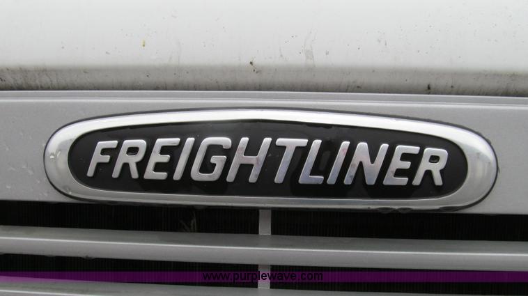 image for item G2173 2003 Freightliner FL70 truck with Schwarze M6000 sweeper