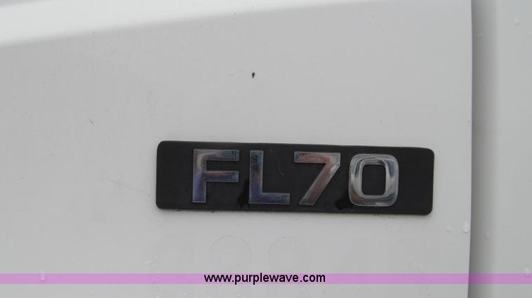 image for item G2173 2003 Freightliner FL70 truck with Schwarze M6000 sweeper
