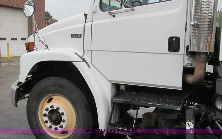 image for item G2173 2003 Freightliner FL70 truck with Schwarze M6000 sweeper