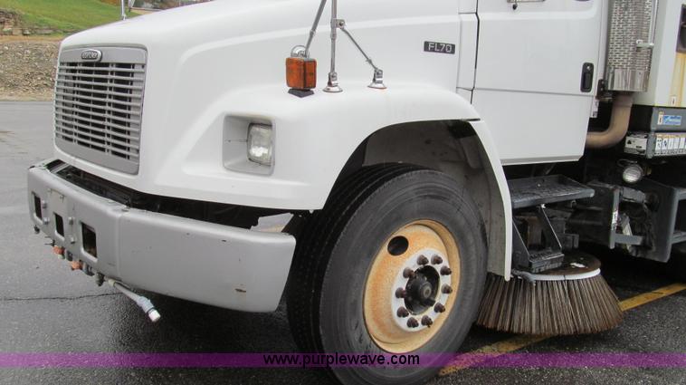 image for item G2173 2003 Freightliner FL70 truck with Schwarze M6000 sweeper