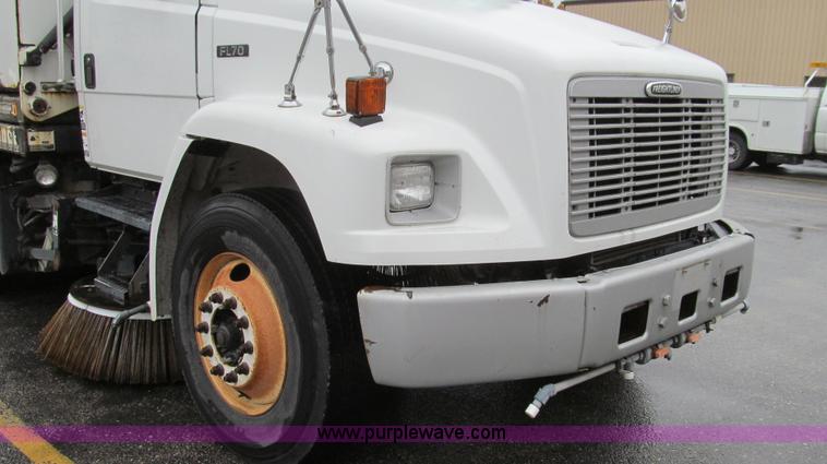 image for item G2173 2003 Freightliner FL70 truck with Schwarze M6000 sweeper
