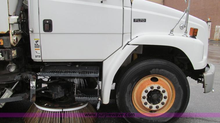 image for item G2173 2003 Freightliner FL70 truck with Schwarze M6000 sweeper