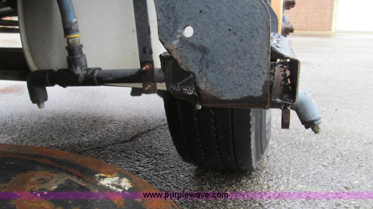 image for item G2173 2003 Freightliner FL70 truck with Schwarze M6000 sweeper