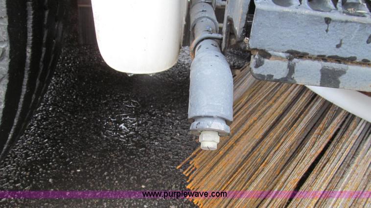 image for item G2173 2003 Freightliner FL70 truck with Schwarze M6000 sweeper