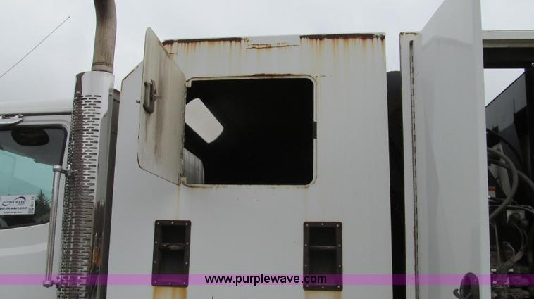 image for item G2173 2003 Freightliner FL70 truck with Schwarze M6000 sweeper